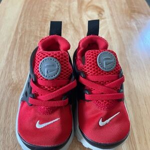 Nike Red and Black Sneakers with Breathable Mesh and Easy Slip-On